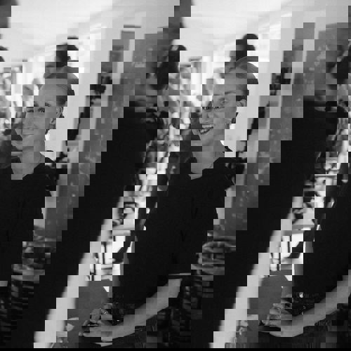 A production manager talking to crew on set on a commercial